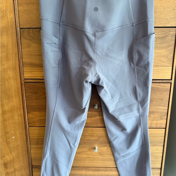 Athleta Salutation stash pocket II 7/8 Tight Leggings Size L - Picture 5 of 7